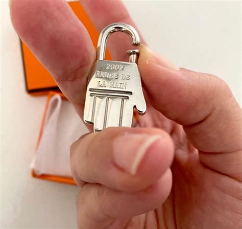 hermes cadena lock charm